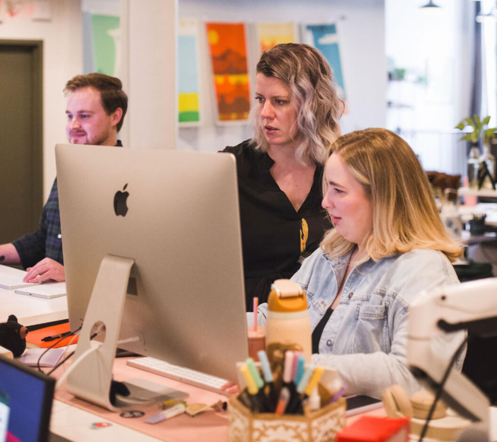 Infantree digital team reviewing a website's UX/UI design.